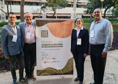 From left: Prof. Emilio Cano, Prof. Luiz AC Souza, E-RIHS Director General Vania Virgili and Prof. Willi de Barros Gonçalves standing next to the ANTECIPA poster under the sunset light at the Federal University of Minas Gerais. Credits: Federica Baldassari